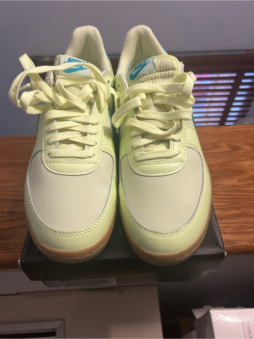 Nike Pale Lime Low-Top Sneakers with Blue Logo